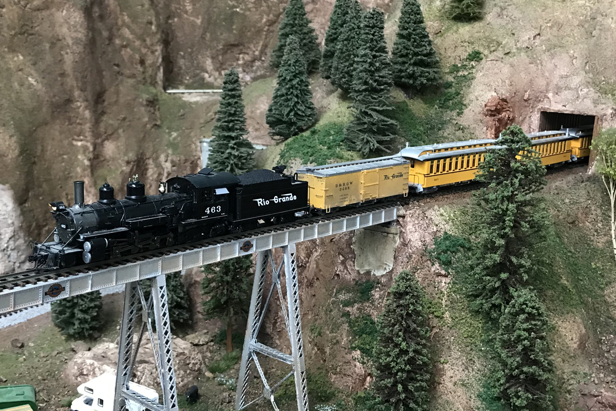 John Vavra's Rio Grande passenger train crossing a bridge.